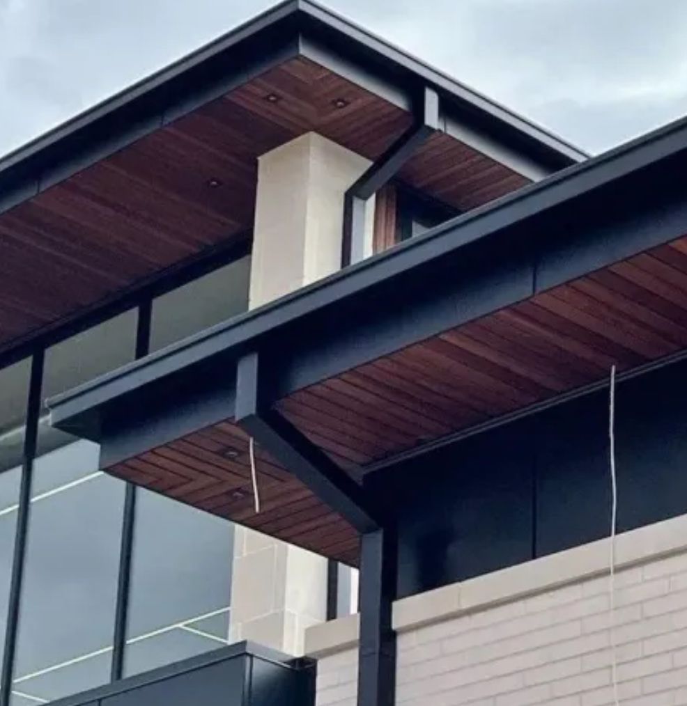 Home exterior with wood soffit and fascia – Pivot Patio & Exteriors